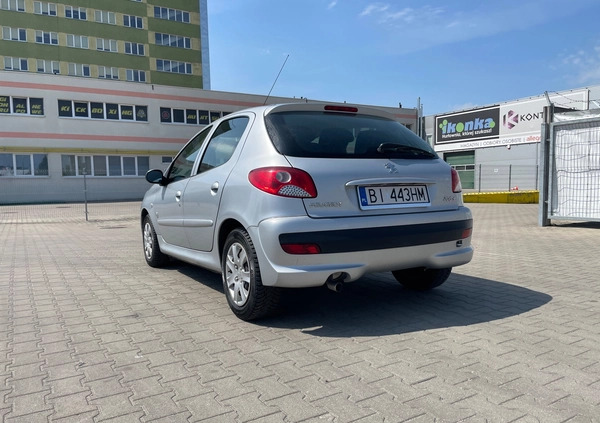 Peugeot 206 plus cena 13599 przebieg: 264620, rok produkcji 2012 z Białystok małe 46